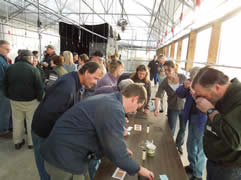 Participants Examining Nematodes with Hand Lens