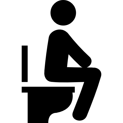 man sitting on toilet